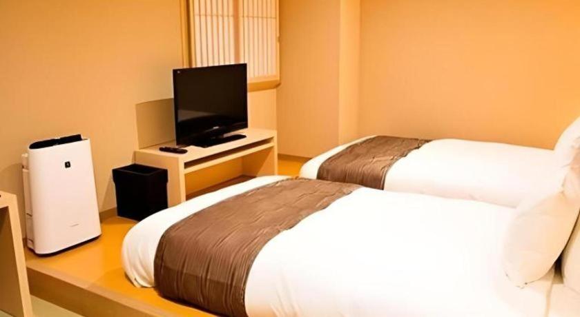 Spa Land Hotel Naito Fuefuki Exteriör bild